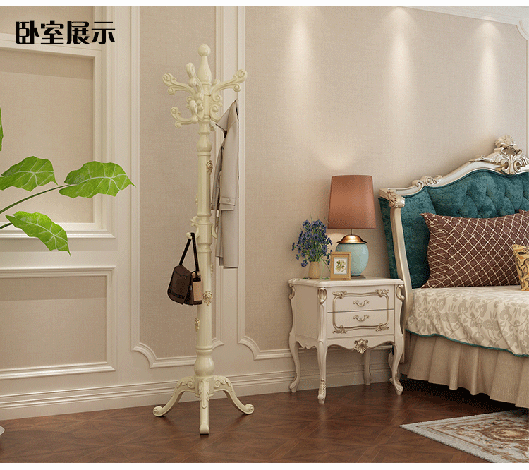 Khắc gỗ rắn châu Âu giá sàn đơn cực hộ gia đình sàn phòng ngủ quần áo giá treo móc áo - Kệ kệ sách mini