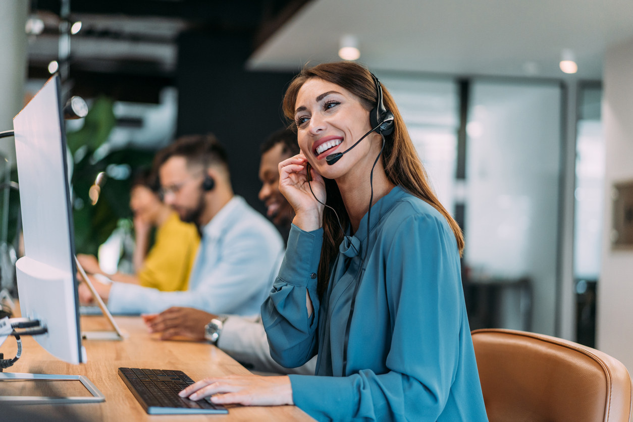 Smiling woman handling customer service