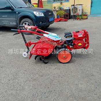 Factory direct sales diesel four-wheel drive hand-held small micro-tiller orchard fertilization trench machine hard-ground mountain soil loosening machine