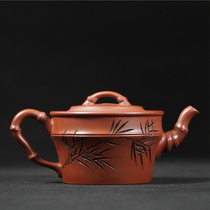 Photo of a Yixing purple clay pot made of purple mud and bamboo sections by Mr. Wang the Gold Medal winner of China Arts and Crafts.