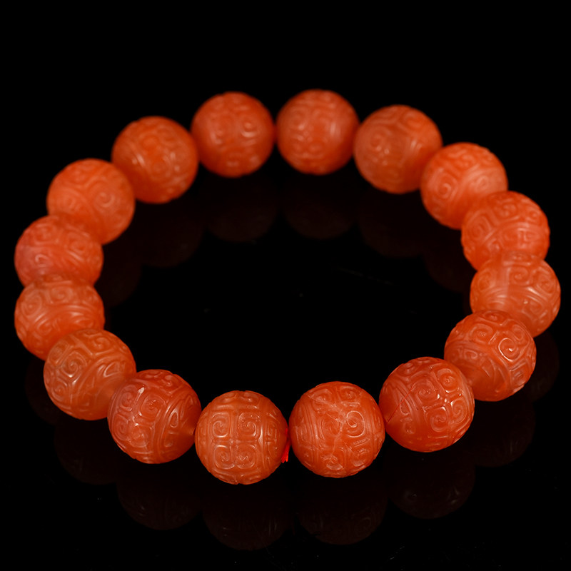 48 84 g 13mm sculpted pearl red - agon ball string of pearl