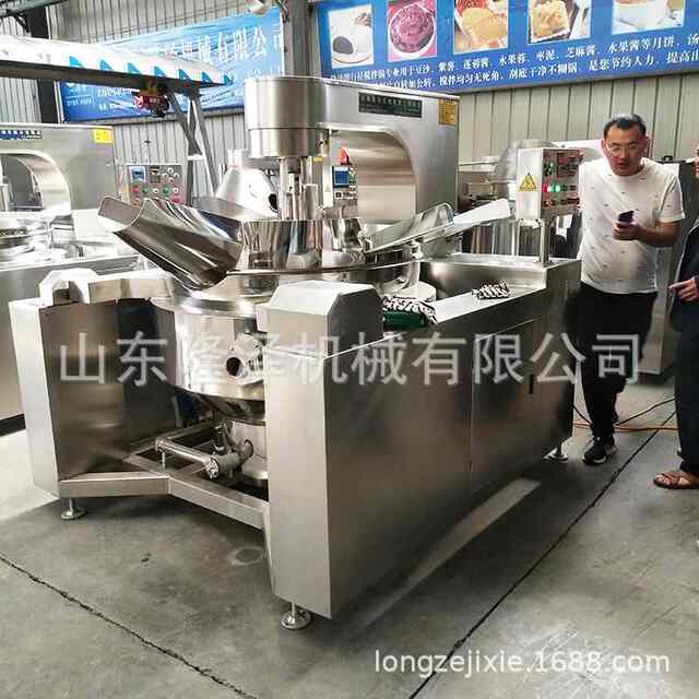 Fried pan with rice and noodles with rice and noodles sauce. Large smart electromagnetic stir frying pan. Sauce making pan.