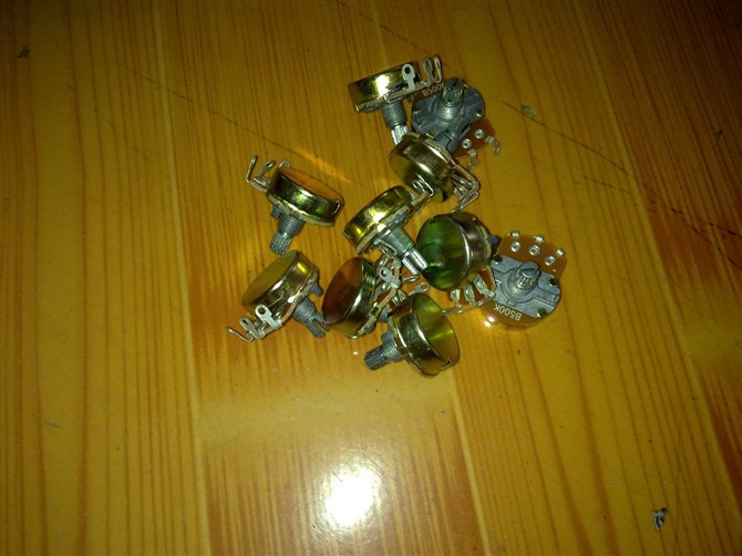 Semi-automatic baler potentiometer adjustment tape switch