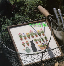 Idyllic cross stitch kit French DMC embroidery green wood and black cat site