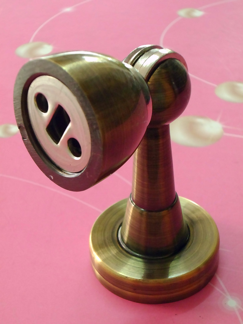 Door top magnetic touch Super magnetic door Magnetic door bumper Zinc alloy Green bronze door Suction suction door buckle Door accessories hardware