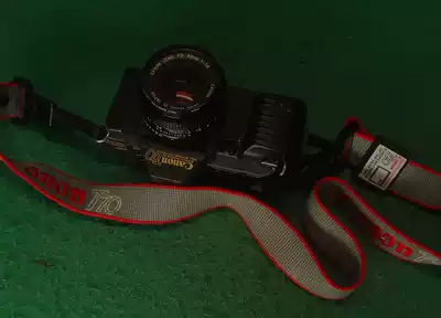 CANON T70 set Machine with commemorative baby bag