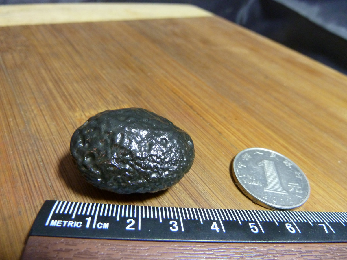 10696 Xinjiang Hami's surface small black mud stone