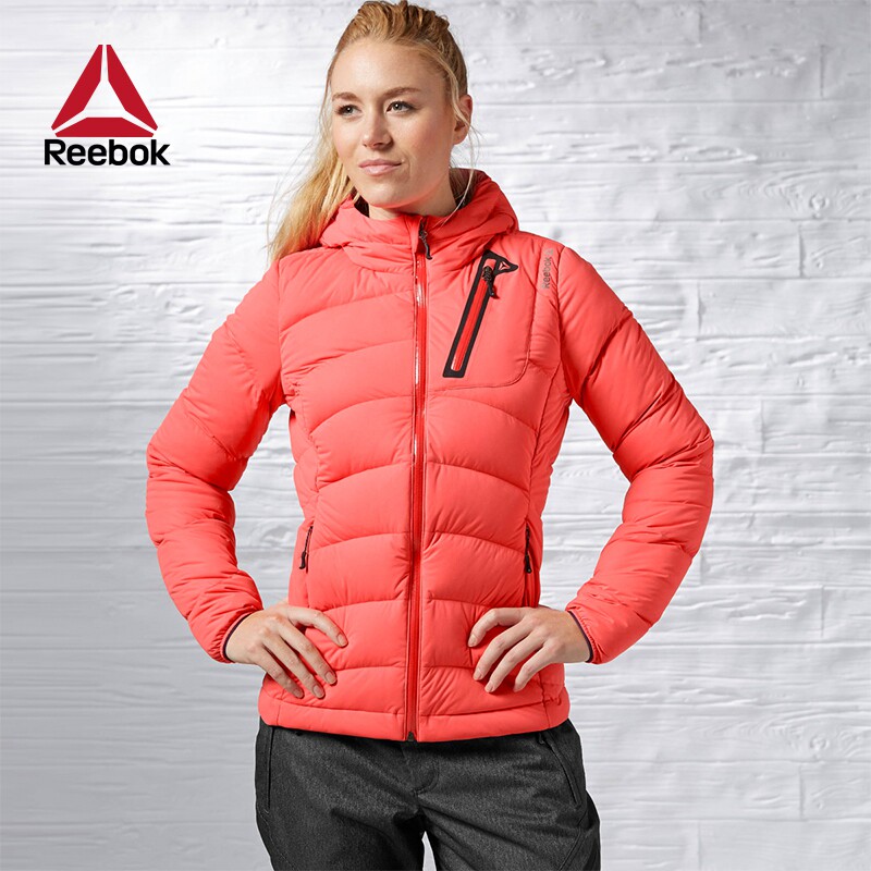 Спортивные пуховики женские. Куртка Reebok женская межсезонная. Reebok куртка женская зимняя желтая. Куртки рибок женские красные. Куртка Reebok женская межсезонная без капюшона.