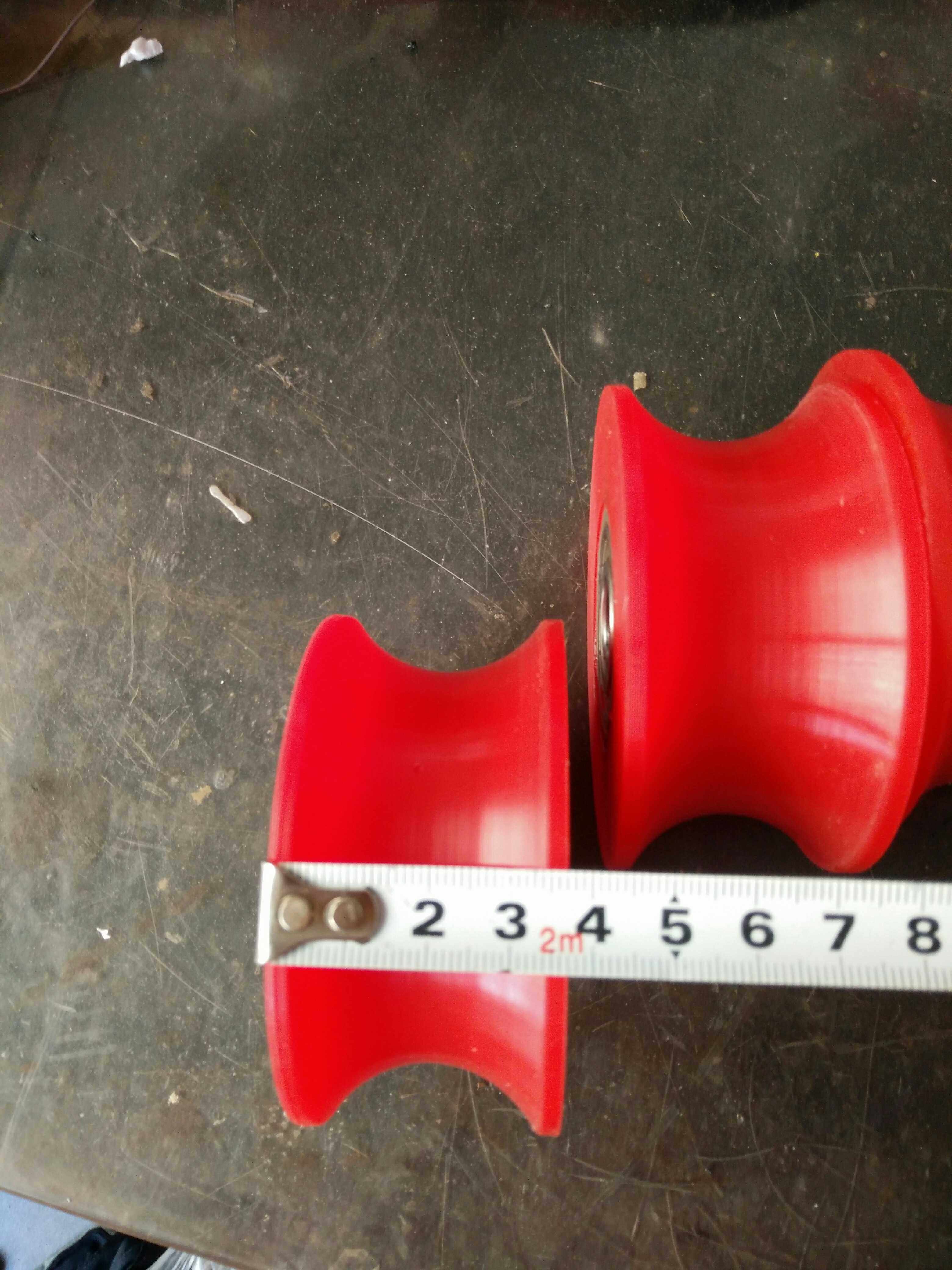 Oval machine track wheel