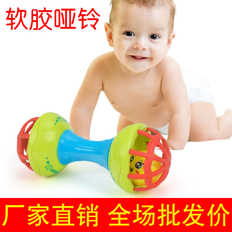 Baby boy baby rocking a bell hand to catch a soft rubber ball gripping toy newborn baby 0-2 years old to teach the puzzle