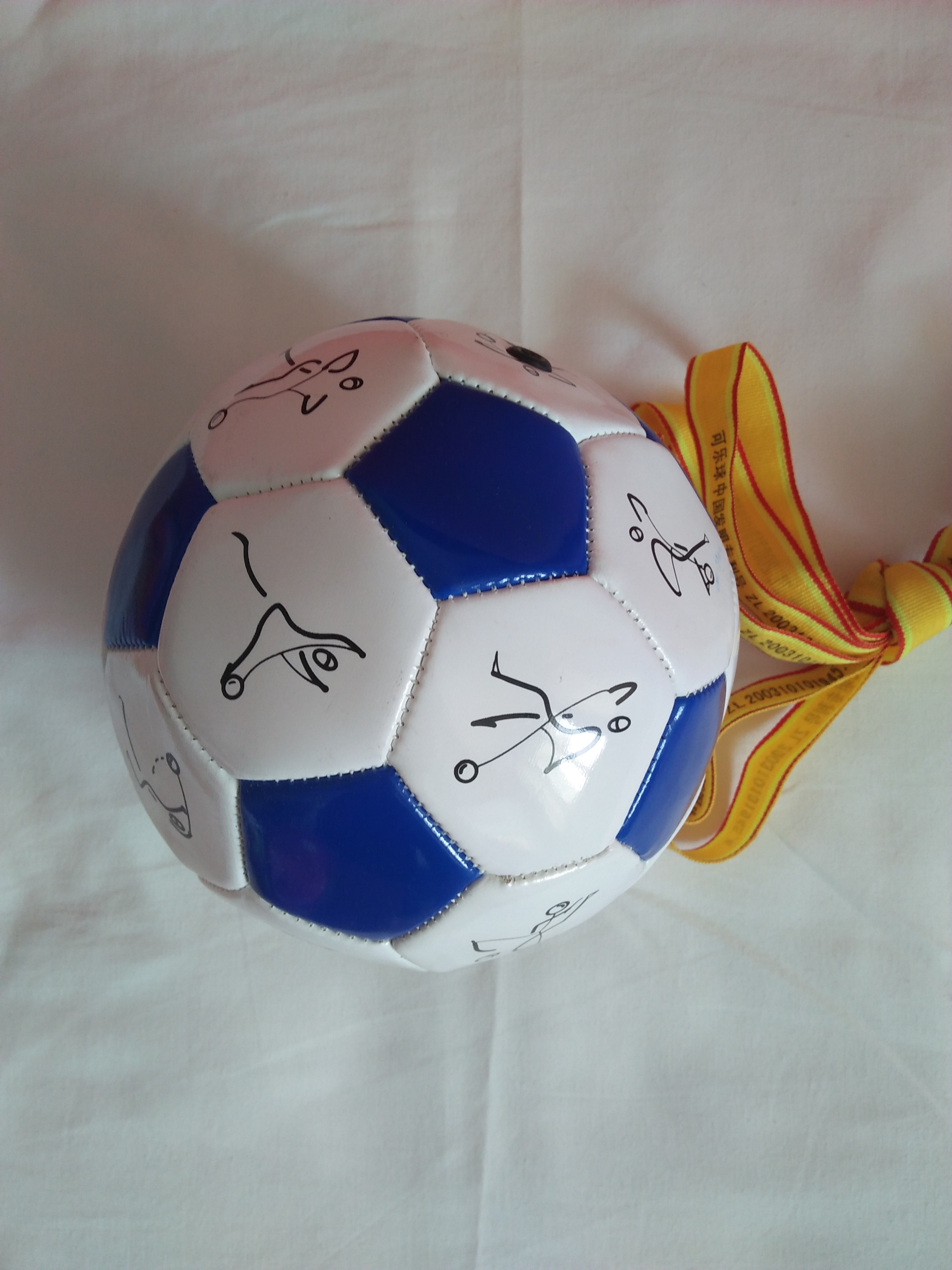 Three generations of Coke balls.