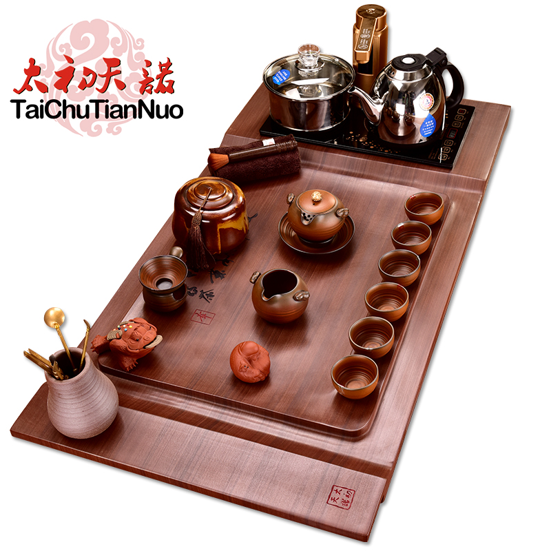 The beginning day, stone tea tray was four one red TanShi tea tea set live purple sand pottery kung fu tea furnace