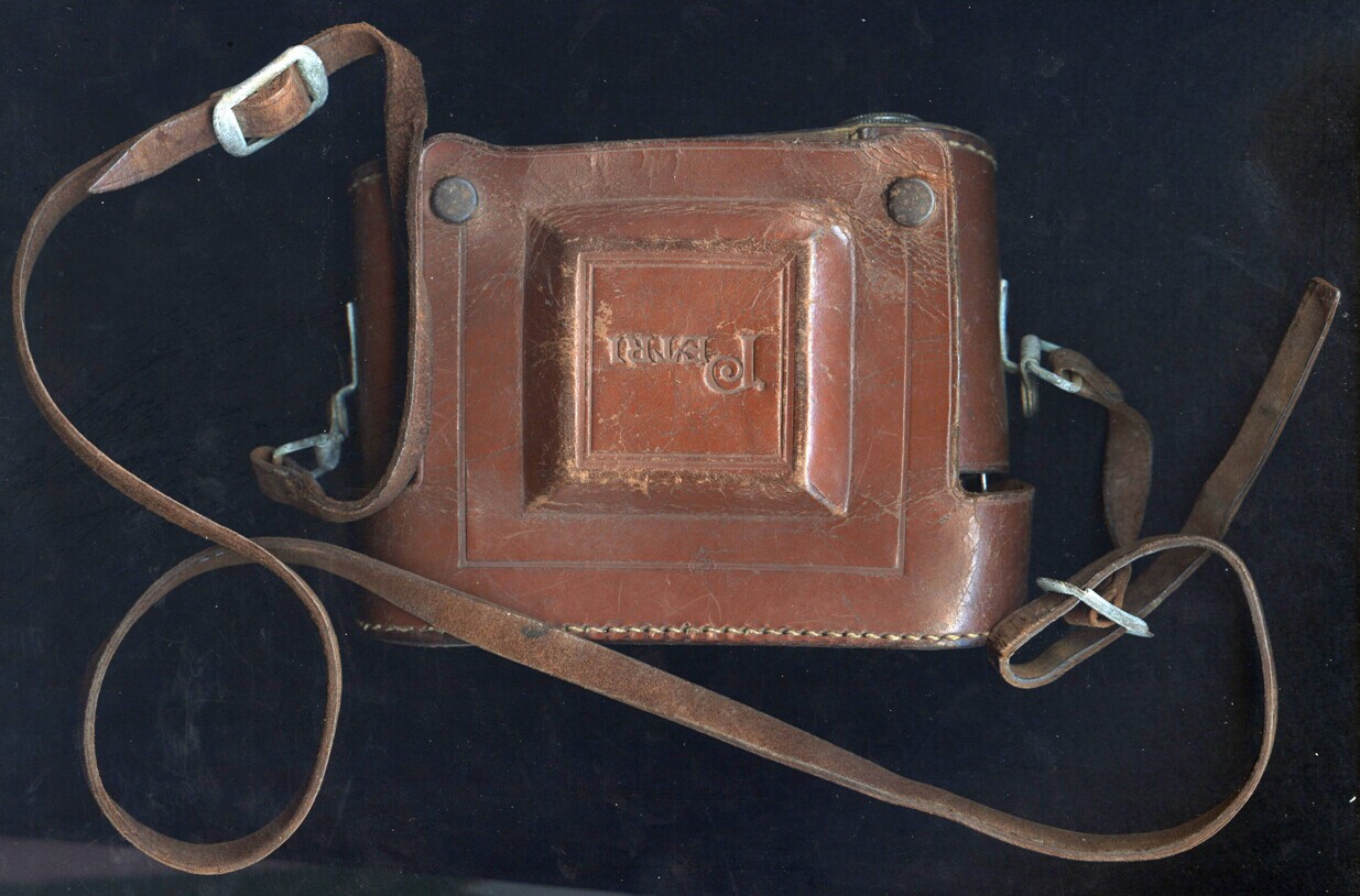 petri semi camera belt holster from petri, Japan, under occupation in 1948