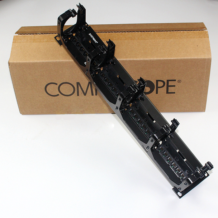 New Comp commscope six class 2U non-shielded 24-mouth matching wire rack (PM-GS3-24) with a wire
