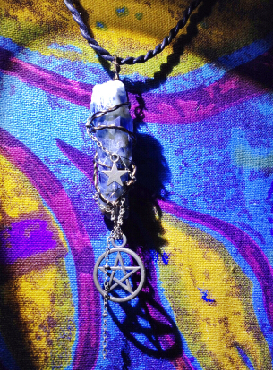 Already out (back to that era No 100) JO's winding art bluestone pendant solitary