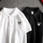 Áo sơ mi cộc tay Mùa hè nguyên bản Nhật Bản nhỏ tươi thêu áo polo ngắn tay Cặp đôi tuổi teen Paul nam T thủy triều áo polo form rộng