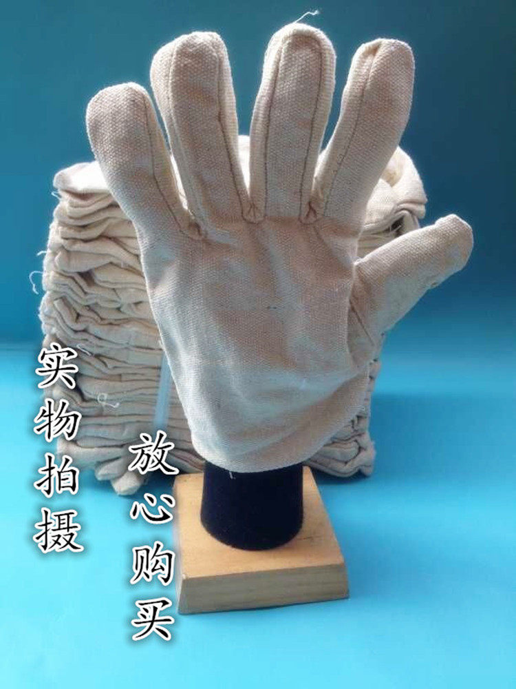 Best selling single-layer canvas protective gloves yellow dot cotton yarn Dingqing welding gloves work labor insurance handling cleaning