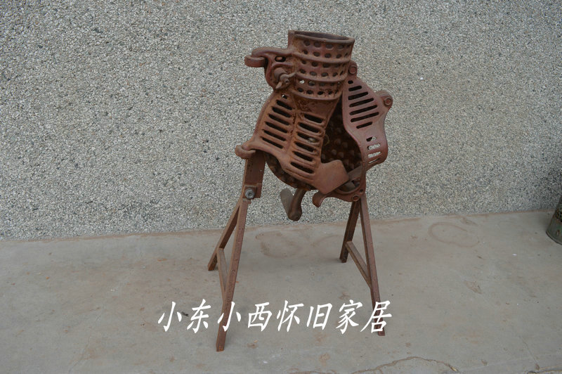 Folklore nostalgic old agricultural tools Hand crank vintage threshing machine old objects manual corn machine Folklore old object collection