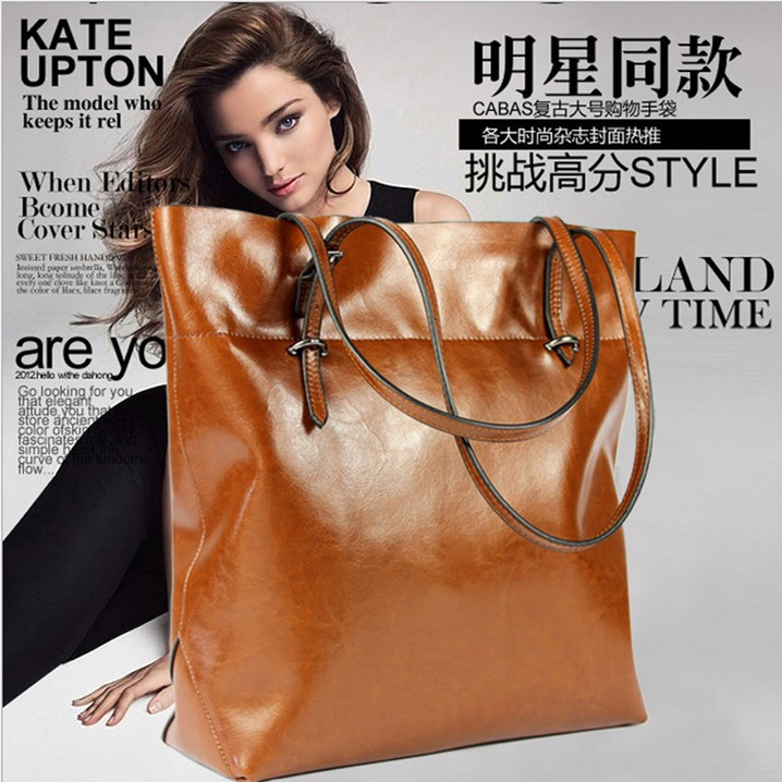 European and American Korean version of the new fashion leather shopping bag simple black leather hand shoulder shoulder bag oversized bag