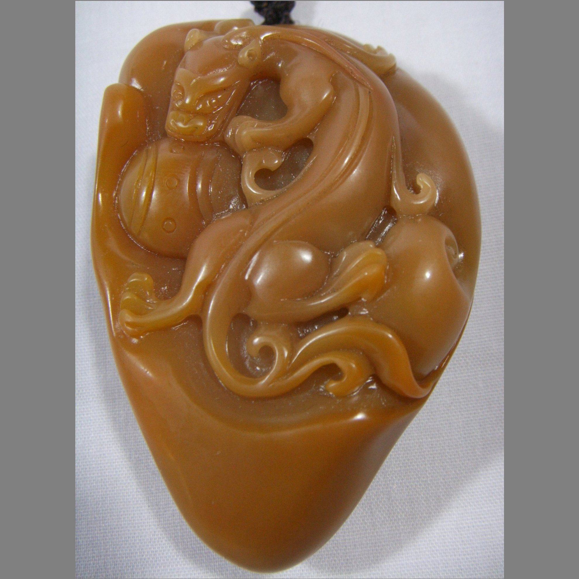 Ancient yellow dragon jade material exquisite natural original carving A goods fine wax frozen hand ornament handle piece Rui god beast handmade art new product