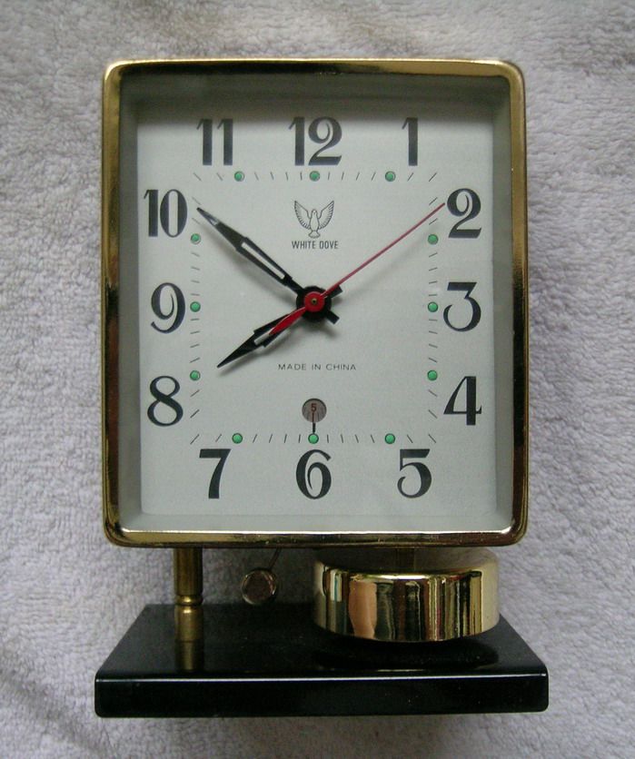 1990s out of print brand new old mechanical alarm clock antique horseshoe watch white pigeon brand next bell single bell gold