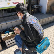 Special) classic handsome long locomotive clothing handmade embroidered sheepskin leather windbreaker female 2021 autumn and winter New