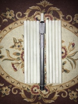 A round pen clip and a 10 round stone pen suit