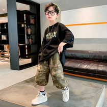 Boy suit 2022 new CUHK children Summer fried street Han version Chauded short sleeve blouses Camouflan Shorts two sets