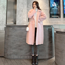 Pregnant womans winter dress with a fur coat and coat jacket