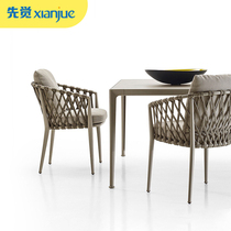 Outdoor leisure table and chair courtyard combination Nordic original designer style courtyard open-air coffee sofa rattan chair