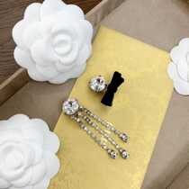 Miao Fashion Water Drill Flow Susweet butterfly knot asymmetrical earrings miu ear clip without earhole female ear nail pendant