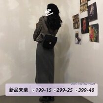 Dongri is a curly vintage split skirt 2021 spring new womens high waist straight mid-length skirt