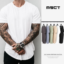 Muscle captain INS sports Tide brand fitness short sleeve T-shirt male brother solid color curved Leisure running training clothes