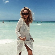 (Clearance does not return or change) Sexy knitted hollow tassel bikini blouse seaside slim swimsuit outside