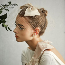 New handmade bridal veil vintage beautiful bow pearl mesh veil Studio photo out of the work modeling yarn