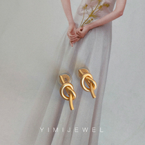 YIMIJEWEL temperament Europe and the United States ins knotted mosquito coil ear clip without ear hole female high-end gold-plated simple earrings