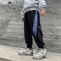 Childrens clothing boys spring and autumn pants foreign autumn clothes 2021 new middle and big childrens casual pants childrens sports pants trousers