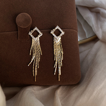 Fashionable foreign style S925 silver needle snake bone tassel long earrings advanced cold wind zircon face thin earrings