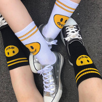 Drew smiley face trendy brand men and women couples with the same trend hip-hop skateboarding sports leisure cotton middle tube long socks