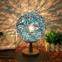 Simple modern rattan ball table lamp bedroom bedside table Taipei European creative fashion solid wood decorative ball dimming night light