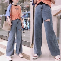 European station summer 2021 New European fashion wash do old high waist hole Bell pants denim trousers women tide
