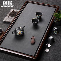 Jinge Wujin Stone tea tray solid wood kung fu tea set rectangular drainage tea table natural stone large simple Tea Sea