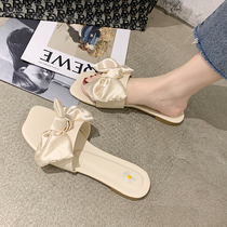 Slippers female outwear 2021 spring and summer season new butterfly knots net red flat base cool drag fairy wind non-slip line slippers