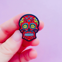 2021 New Korean small jewelry fashion corsage pin red cartoon skull brooch badge accessories women
