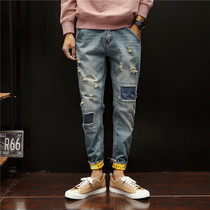 Mens version of straight jeans mens loose hole Korean version of the trend patch beggar pants slim flip nine foot pants