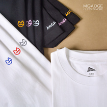 Migao grid cotton autumn solid color print men and women couple impervious T-shirt round neck loose straight tube breathable short sleeve tide