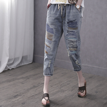 Han Suoyi retro art spring and summer new color line embroidery seven-point jeans women's high waist small Harlan pants