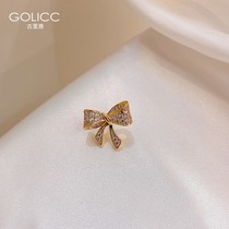 Advanced sense bow small brooch cute Japanese anti-light buckle pin ins tide personality high-grade female fixed clothes