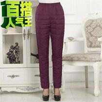 Middle-aged and elderly feather pants women wear high waist to show warm winter thickened large size cotton new pants