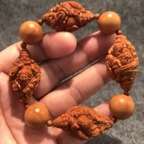 Southern neat four heavenly kings olive Hu nuclear carving handmade 20 red oil nuclear three-dimensional transparent carving text play hand string chain